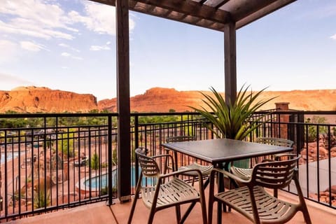 Soak in sweeping red-rock sunsets from your private balcony.