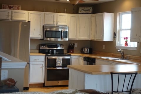 Kitchen is located upstairs