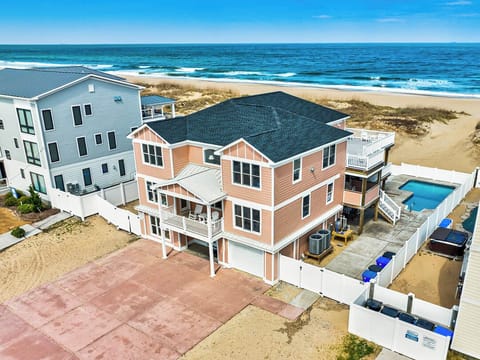 Front Aerial of Seas the Day Beach House