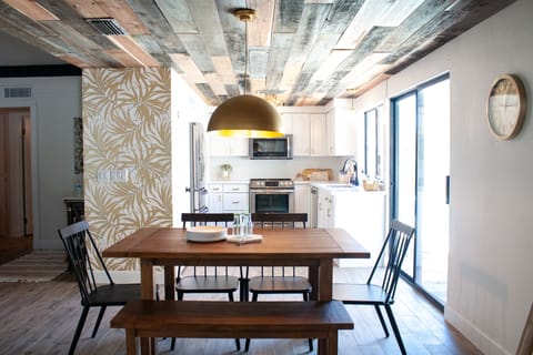 Kitchen with reclaimed wood ceilings fully stocked