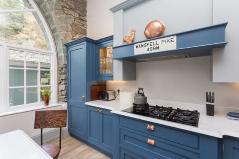 Kitchen cupboards and gas hob