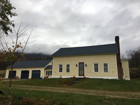 The Yellow Farmhouse in the Fall
