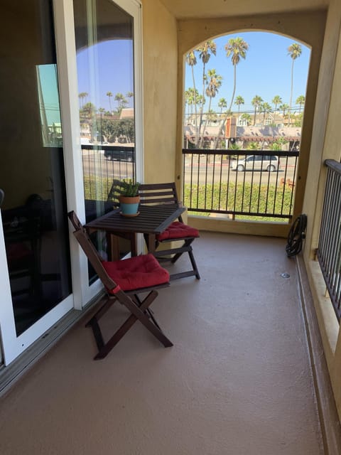 Balcony off living/kitchen area with seating 