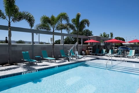 Soak up the sun beside the refreshing outdoor pool.