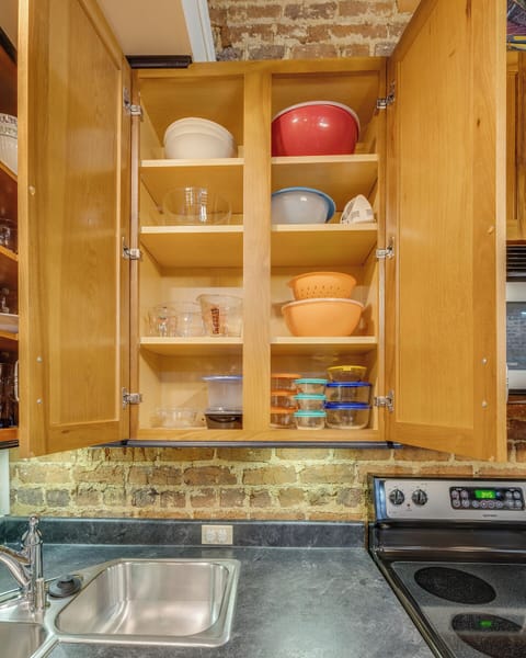 The kitchen has all of the silverware, kitchen utensils, serving dishes, plates, & glassware needed to prepare your meals.