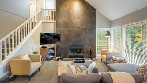 Main Floor - Living Room With Wood Burning Fireplace
