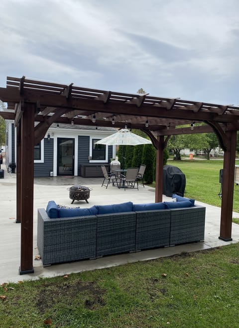 Pergola with cover to protect from rain and sun for your outdoor fun !