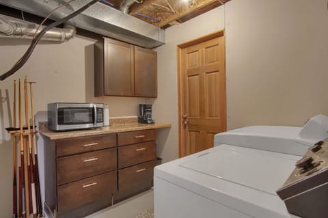 Full size washer/dryer.  Pots & pans & dishes.