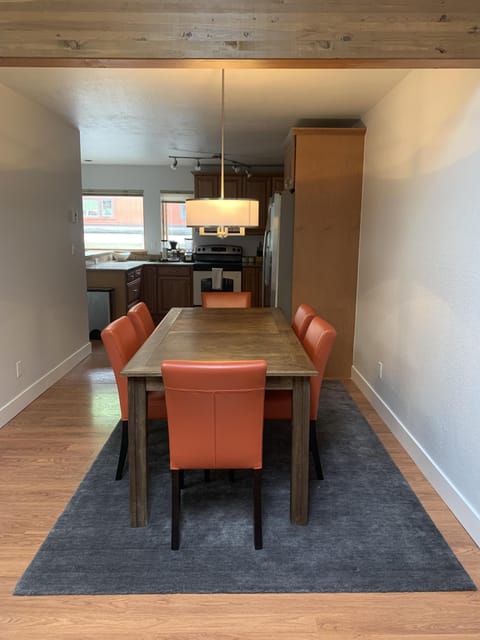 Modern dining area with comfortable seating up to 8