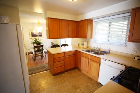 LARGE KITCHEN WITH EVERYTHING YOU NEED INCLUDING DOUBLE DISHES AND POTS AND PANS