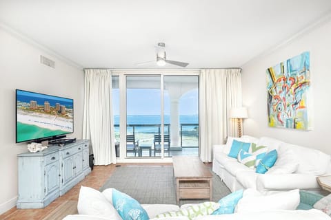 Relax in your bright living space with stunning views through floor-to-ceiling windows opening to your private balcony.