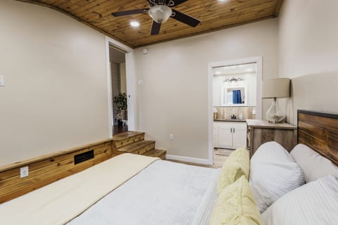 Master bedroom w/ attached bathroom. Fully furnished. Queen size bed.