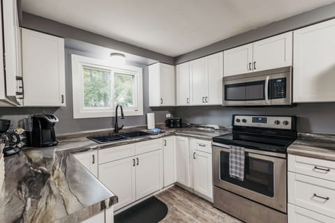 Full size kitchen. Recently remodeled. Stocked with standard kitchen supplies.