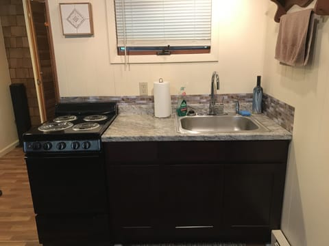 Kitchen area with stove/range 