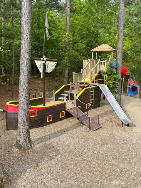 The incredible 30-foot pirate ship playground makes this one of the most unique family cabins in Broken Bow.
