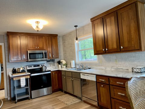Kitchen is fully stocked with dishes, pots & pans, basic spices. Etc.