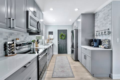 open and bright gourmet kitchen with everything you need.