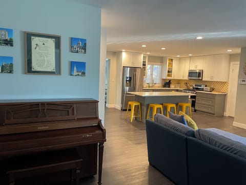 Family room (85 inch TV) opens to kitchen