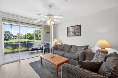 Living area with slider access to private screened lanai