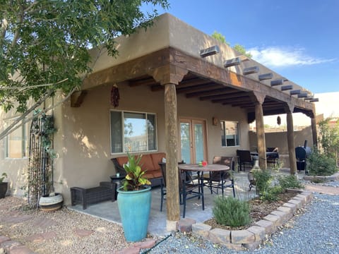 Three outdoor patio seating areas plus smoker/grill