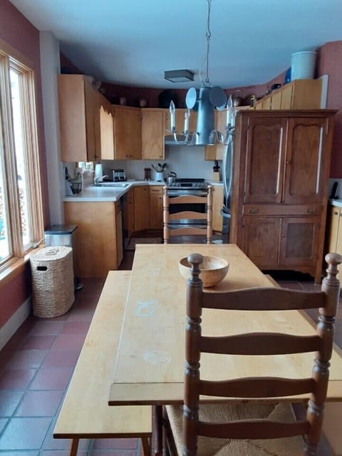 Full view of kitchen and eat in table.  New LG appliances