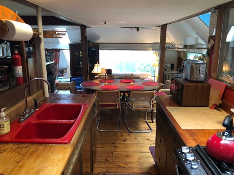 Looking through kitchen to dining room which overlooks living room