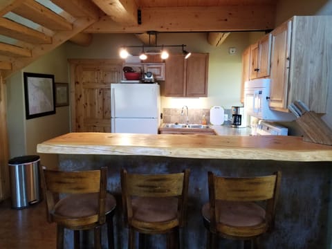 Bar stools at raised eating area