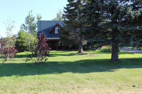 Cabin looking North, 57 miles from West Yellowstone, big yard with parking area