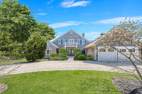 Front of house with circular driveway