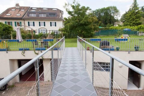 The suspended walkway to the garden