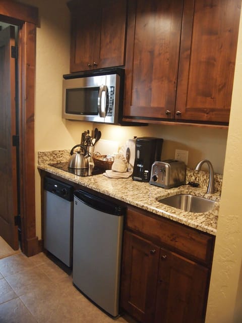 Kitchenette in attached studio unit, with separate living room and second master