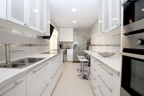 Modern kitchen is fully equipped with all the appliances