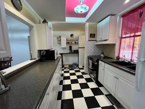 Kitchen with coffee bar and induction stove