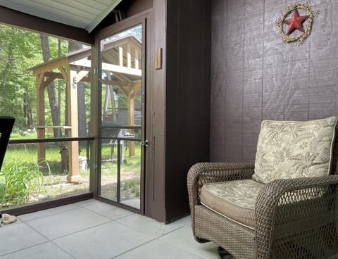 Screened in patio: enjoy the outdoors in any weather.