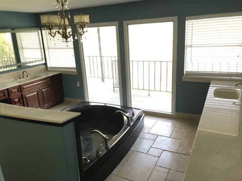Master Bath 
Large soaking tub with toilet, Bidet and two lighted Vanities