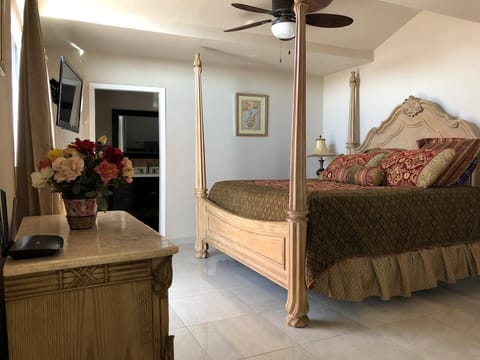 Main bedroom king size bed, restroom with shower