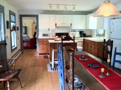 Open Kitchen/Dining Area
The Social Hub!
Entry and Garden Doors