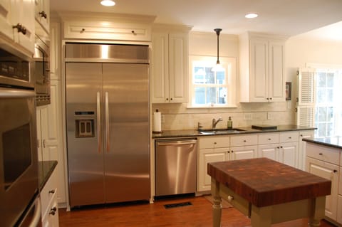 Kitchen:  Two ovens, convection microwave, dishwasher & instant hot water heater