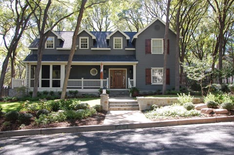 View of our home from the street.  Screened porch located on left side of home.