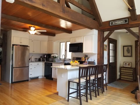 Kitchen and hall leading to master suite