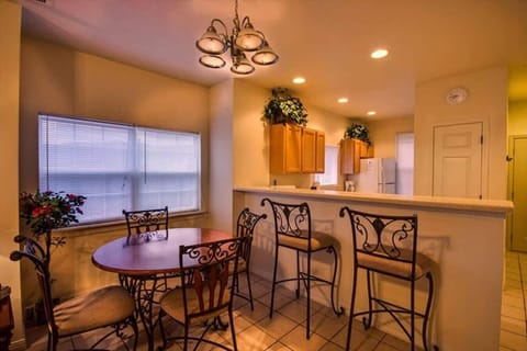 Kitchen island offers extra seating for dining.