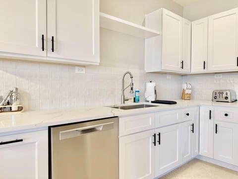 Bright, modern kitchen with sleek appliances and ample storage