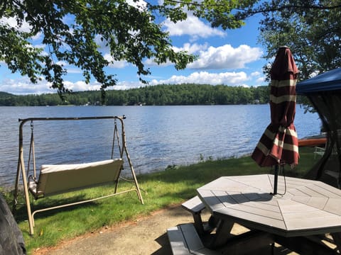 Charcoal and gas grills. Large picnic table.  In season, screened canopy.