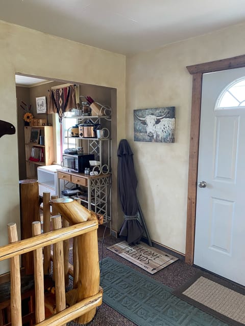 view of front door into the kitchen