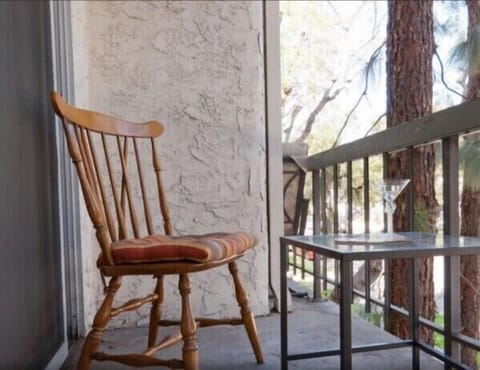 Relax on the balcony overlooking a quite residential neighborhood.
