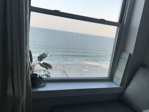 Cozy window seat with cushions and spectacular ocean views & breezes.