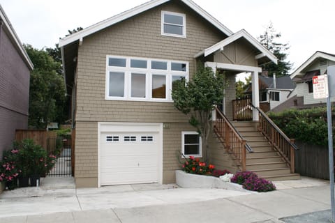 Private entry through gate and down walkway. Assigned parking space on left.