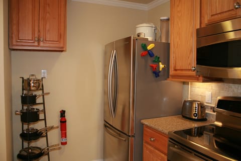 Enclume pot rack, Cuisinart cookware, Samsung French refrigerator with auto ice