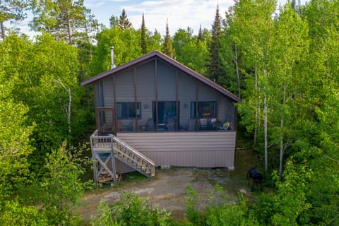 Vaulted screened-in porch.