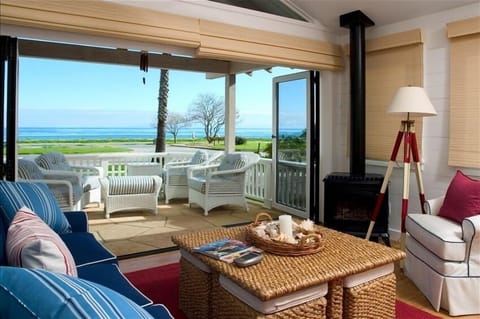 Ocean view from the living room with patio doors open.